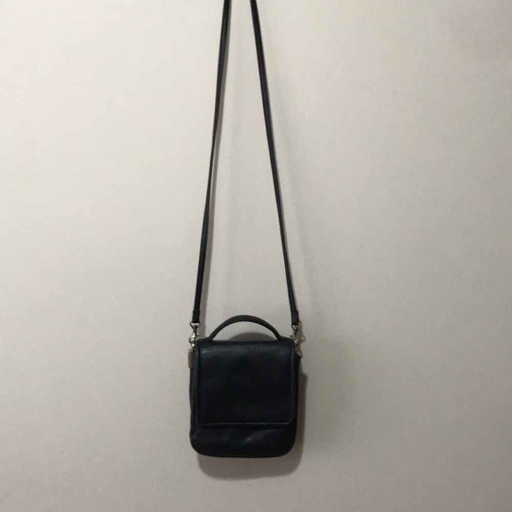 Black leather across the shoulder bag